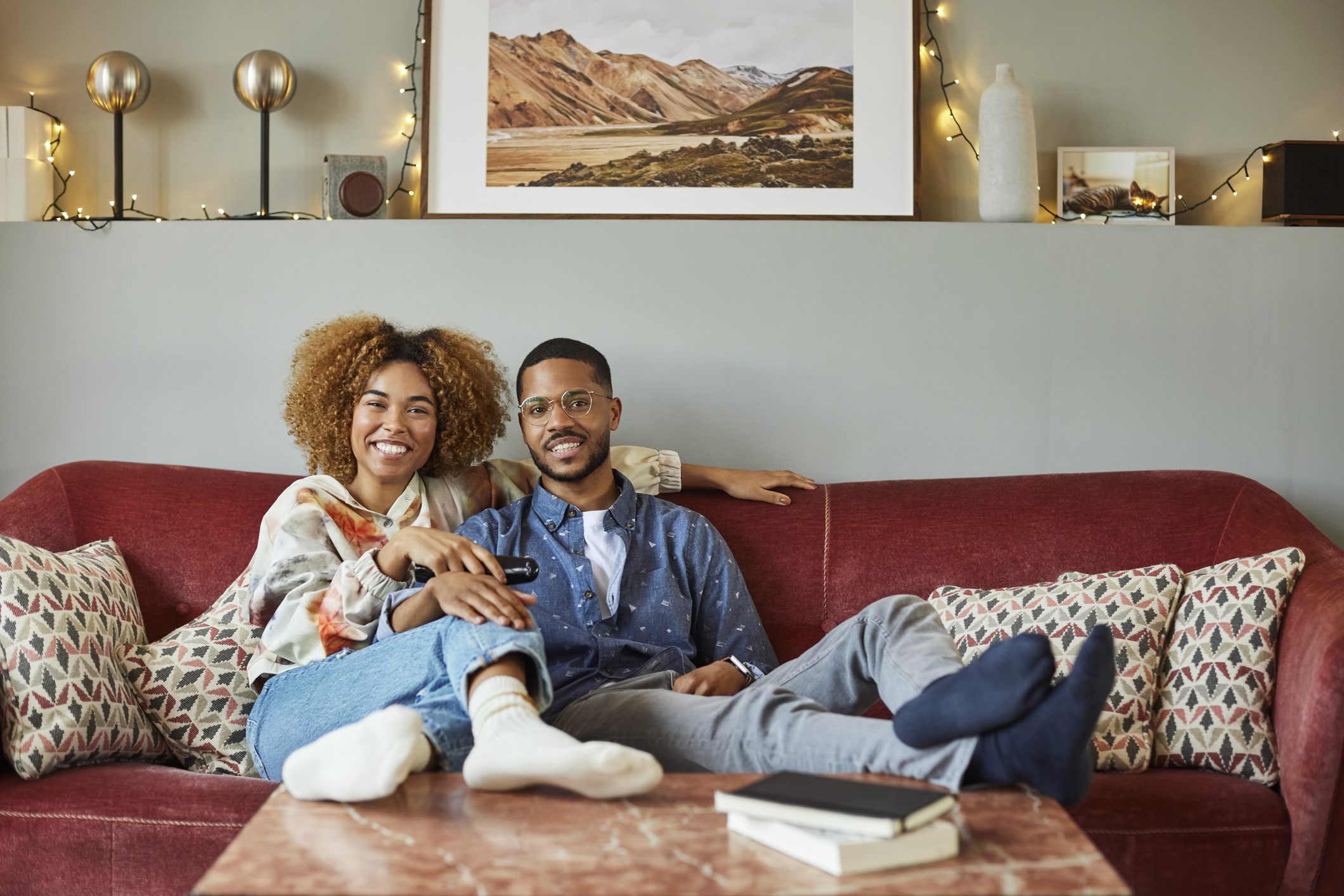 Young couple sitting on couch